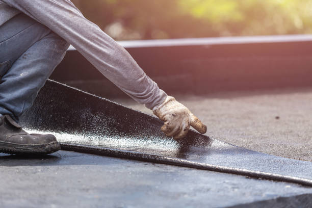 Professional Exterior Waterproofing technician working in Independence, KS